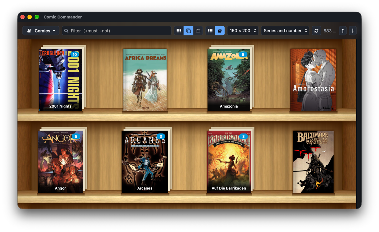 The shelf look: covers of Amazonia, Angor, Arcanes and others stand on two wooden shelves, series as stacks